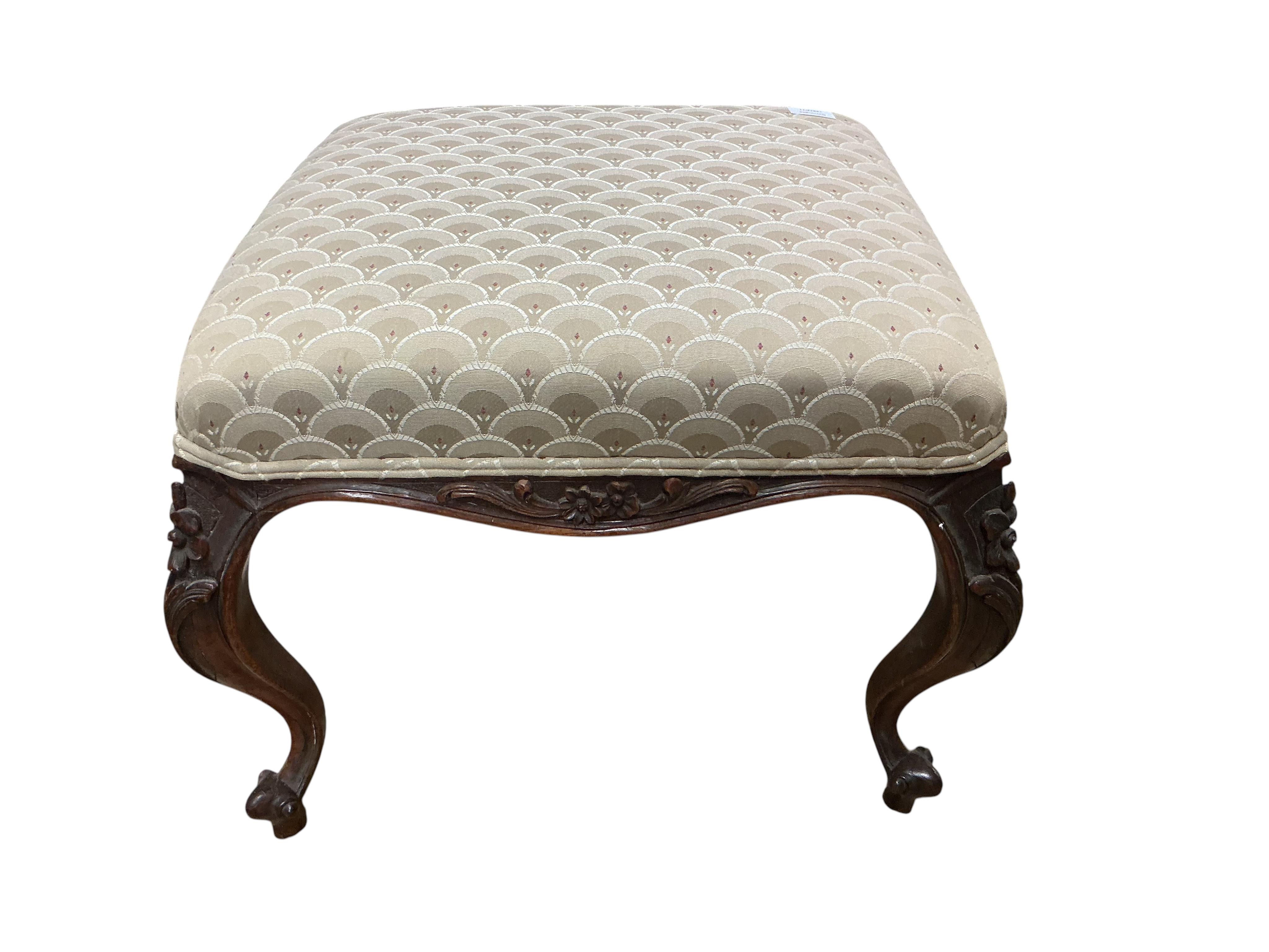 A Victorian carved rosewood dressing stool, width 53cm, depth 54cm, height 41cm
